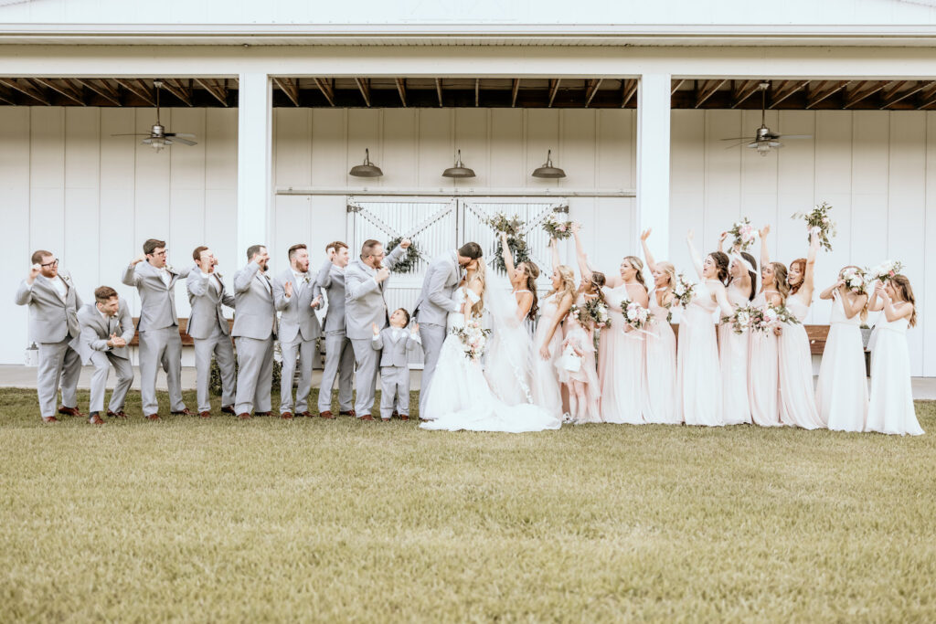 Outdoor Bridal Party Portrait | Covington Farms Wedding Venue | Groomsmen in Grey Suits, Light Pink Bridesmaids Dresses