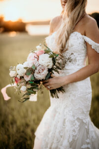 Pale Pink and White Roses, Peonies, and Other Florals Bridal Bouquet with Greenery