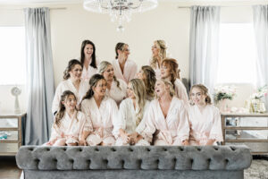 Bride and Bridesmaids in Pale Pink Silk Robes Wedding Portrait | Tampa Rustic Venue Covington Farms
