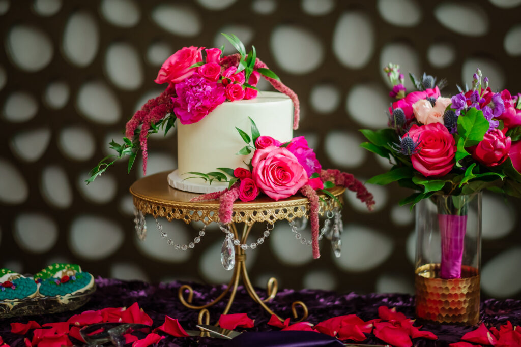 One Tier White Wedding Cake Decorated with Real Pink Roses, Hanging Amaranthus on Gold Cake Stand | Tampa Bay Wedding Cake The Artistic Whisk | Wedding Planner Perfecting the Plan | Wedding Florist Iza's Flowers
