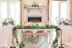 Wedding Sweetheart Table with Pink Velvet Chairs and Greenery Décor | Rustic Wedding Reception South Florida Covington Farms