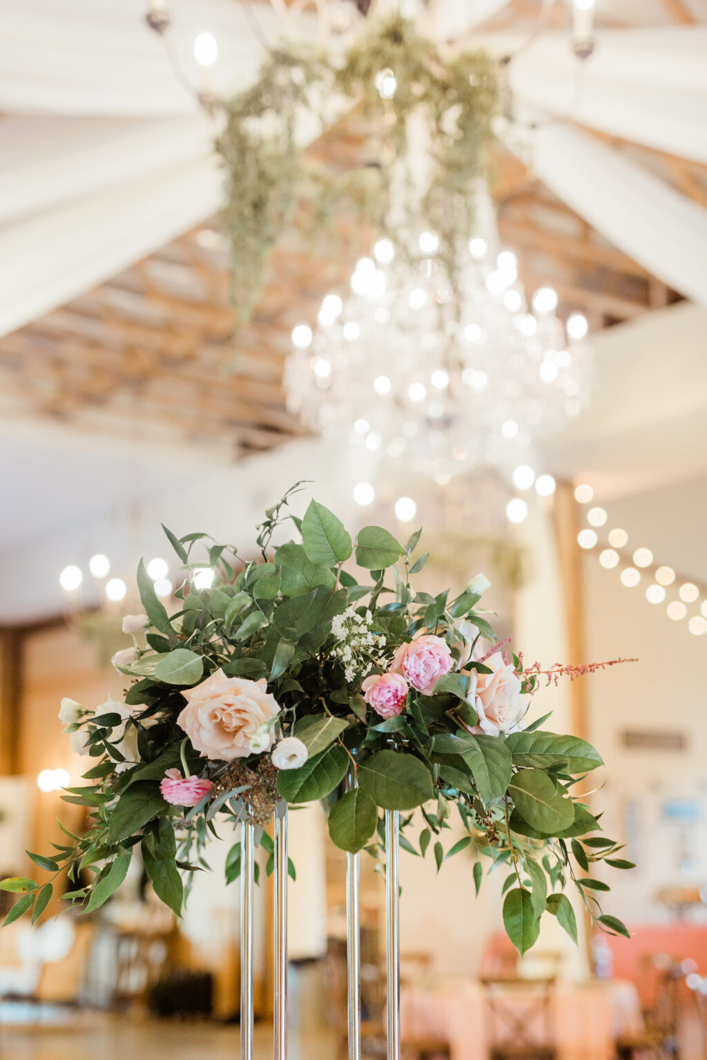 Rustic Tall Floral Centerpieces with Pink Florals and Greenery in Tall Silver Stand