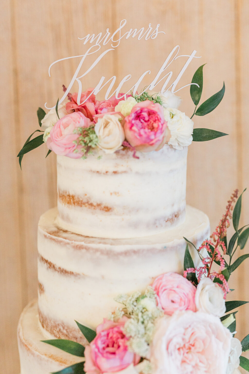 Semi Naked Three Tiered Wedding Cake with Pink and White Peony Floral Detail and White Wedding Cake Topper