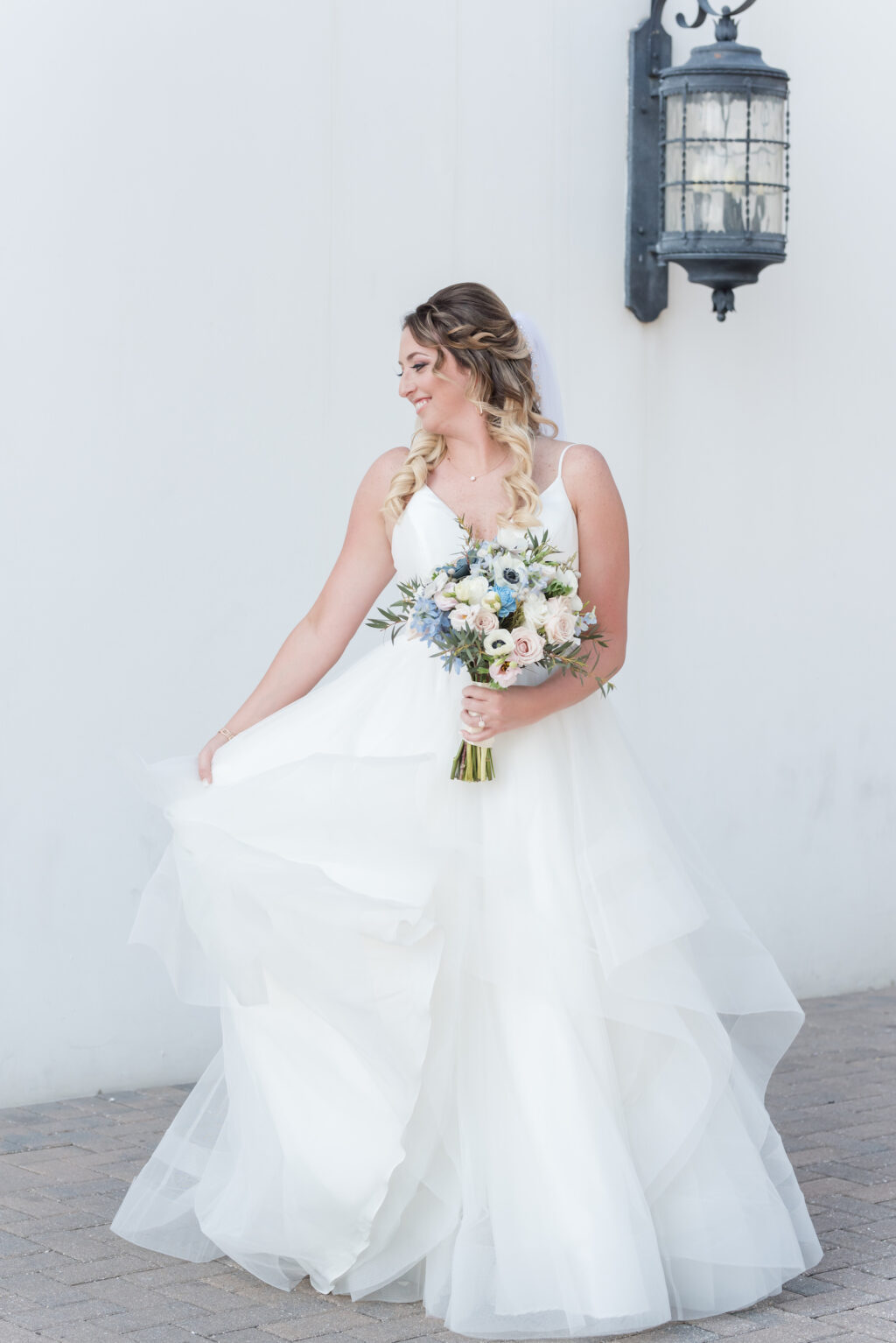 Bride in Tulle Ballgown with Bridal Bouquet with Blue and Cream Florals | Ashley Renee Bridal | Adore Bridal Hair & Makeup