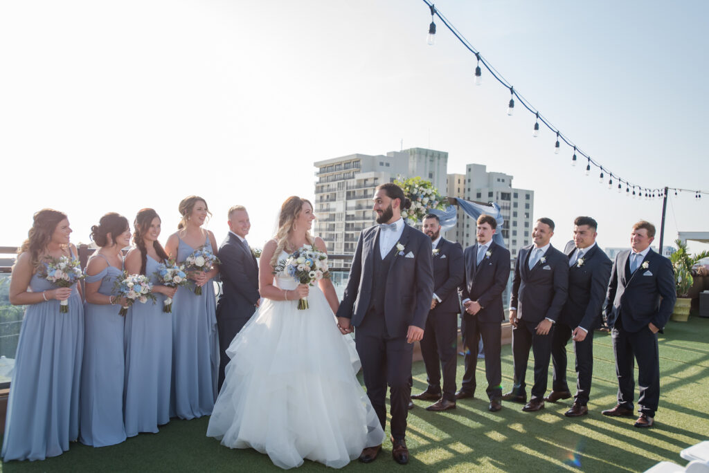 Bride and Groom with Bridal Party in Navy and Dusty Blue Wedding Portrait | Tampa Bay Rooftop Wedding Venue Hotel Zamora
