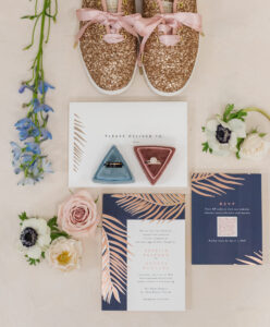 Modern Tropical Navy and Pink Wedding Invitations with Diamond and Gold Halo Engagement Ring and Wedding Band | Glittery Gold Tennis Shoes with Pink Laces by Kate Spade x Keds