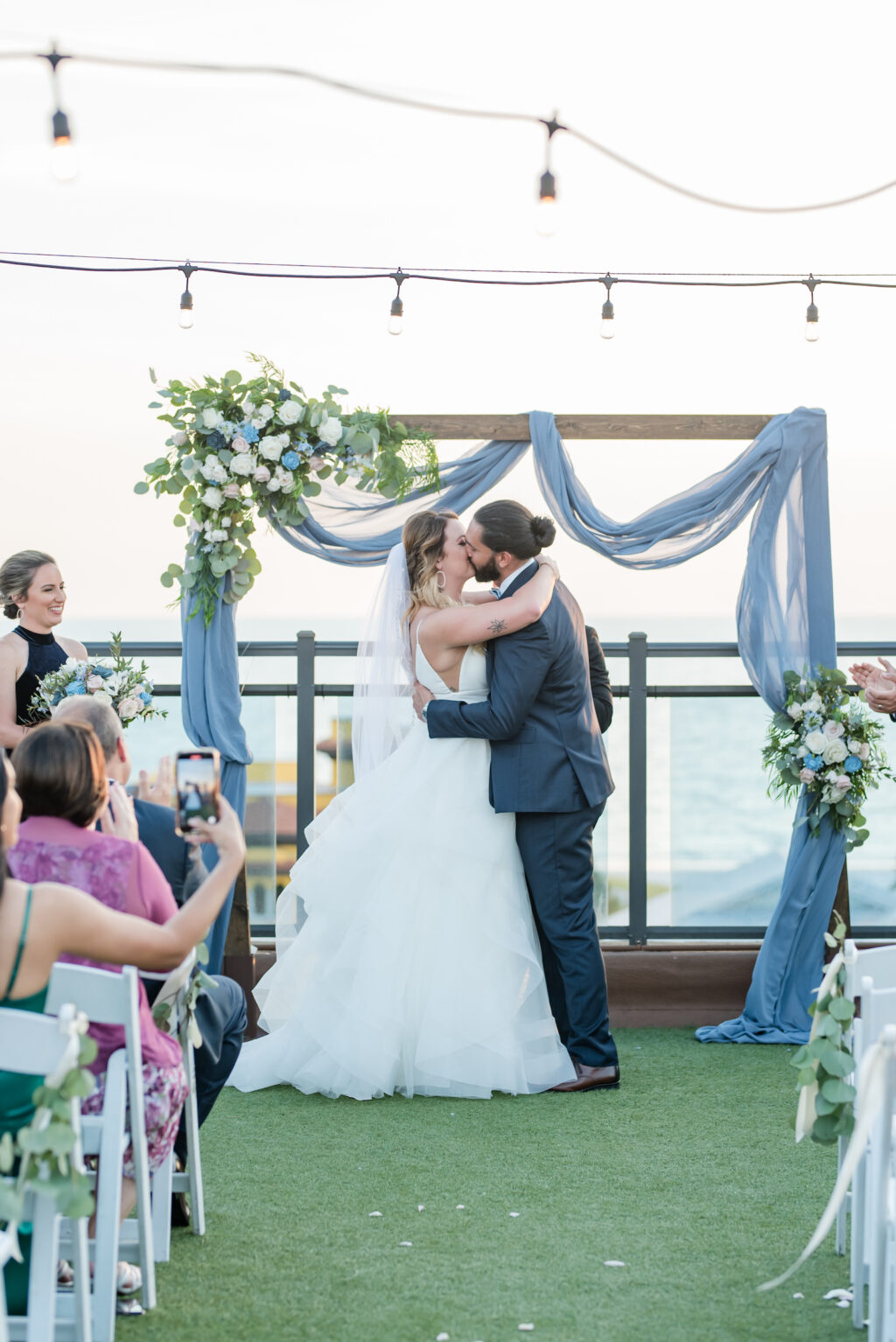 Bride and Groom First Kiss at Tampa Bay Rooftop Wedding | Venue Hotel Zamora
