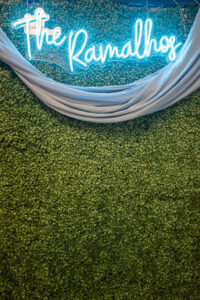 Neon Wedding Sign with Couples Last Name on Greenery Wall Wedding Décor | Elegant Affairs by Design