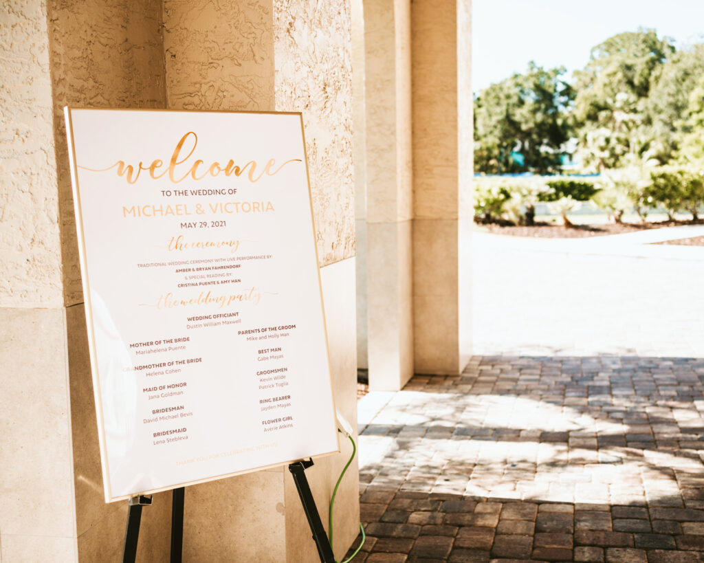 Classic white and gold wedding welcome sign ceremony decor | Tampa wedding photographer Bonnie Newman Creative | Wedding planner Coastal Coordinating