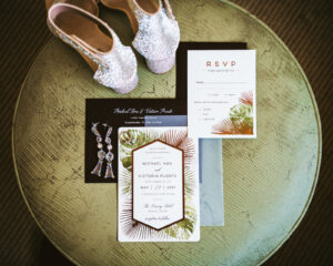 Elegant tropical palm leaves wedding invitation suite, silver rhinestone bridal shoes, crystal dangling earrings | Tampa wedding photographer Bonnie Newman Creative