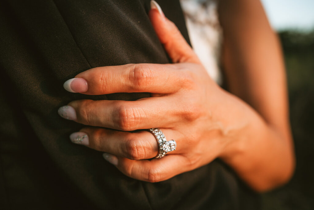 Bride diamond oval engagement ring hand wedding photo | Tampa wedding photographer Bonnie Newman Creative