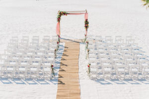 Outdoor Beachfront Wedding Ceremony with Bamboo Runner and Pink Alter Drapery | Hilton Clearwater Beach Wedding Ceremony
