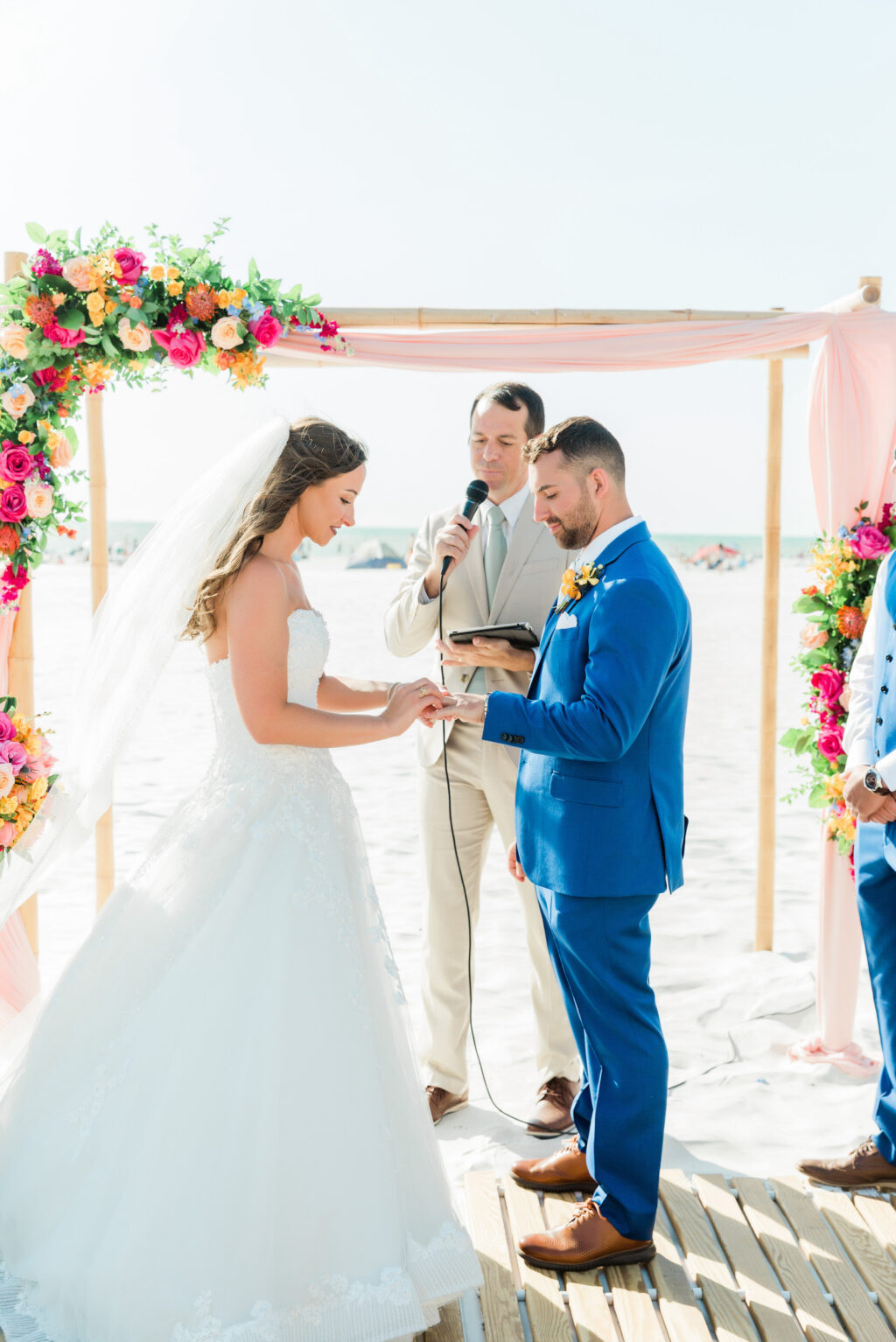 Bride and Groom Exchange Vows Portrait | Outdoor Beach Wedding Ceremony at Hilton Clearwater Beach