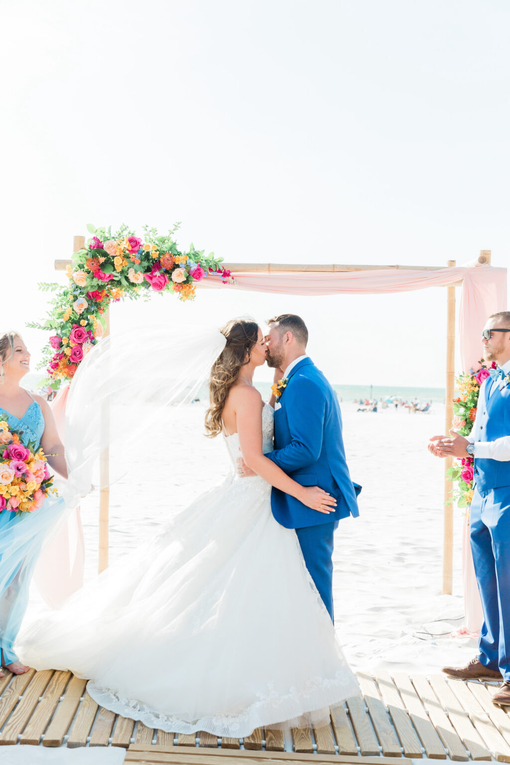Bride and Groom First Kiss Portrait | Outdoor Beach Wedding Ceremony at Hilton Clearwater Beach
