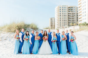 Bridal Party in Blue Suits and Turquoise Bridesmaids Dresses Portrait | South Florida Beach Front Weddings