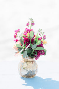 Floral Décor Wedding Centerpieces with Fuchsia Pink and Greenery in Glass Round Vase