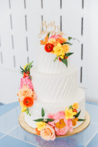 Three Tier Wedding Cake with Bright Floral Details