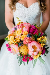 Bright and Vibrant Floral Wedding Bouquet with Pink and Yellow Flowers and Greenery Details