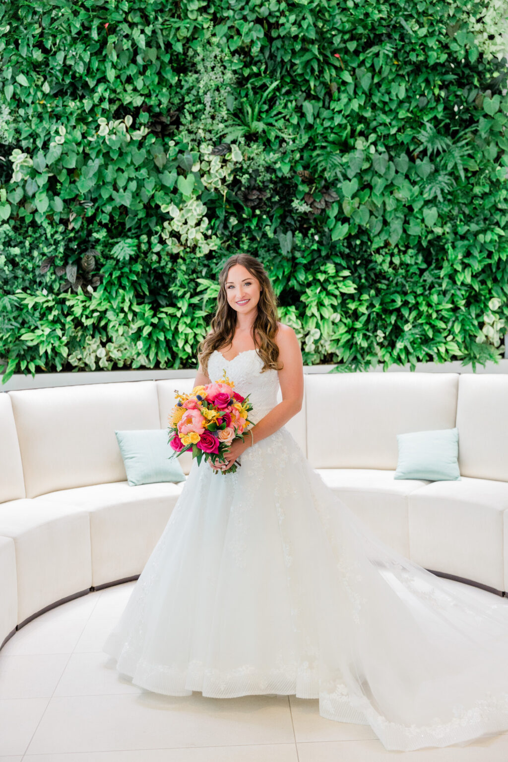 Bride in Sweetheart Neckline Ballgown Wedding Dress with Pink, Orange, and Yellow Bridal Bouquet | Maggie Sottero | South Florida Hilton Clearwater Wedding Venue