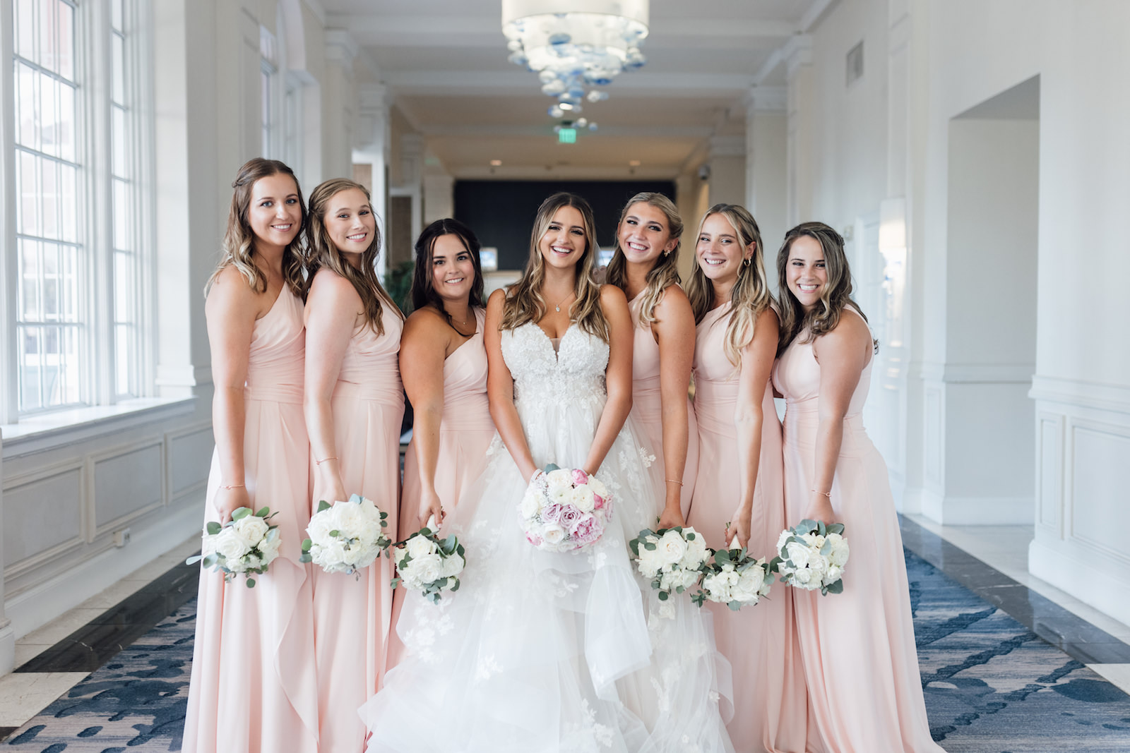Bride and Bridesmaids in Blush Long Bridesmaids Dresses Wedding Portrait with White and Greenery Bouquets | Bruce Wayne Florals