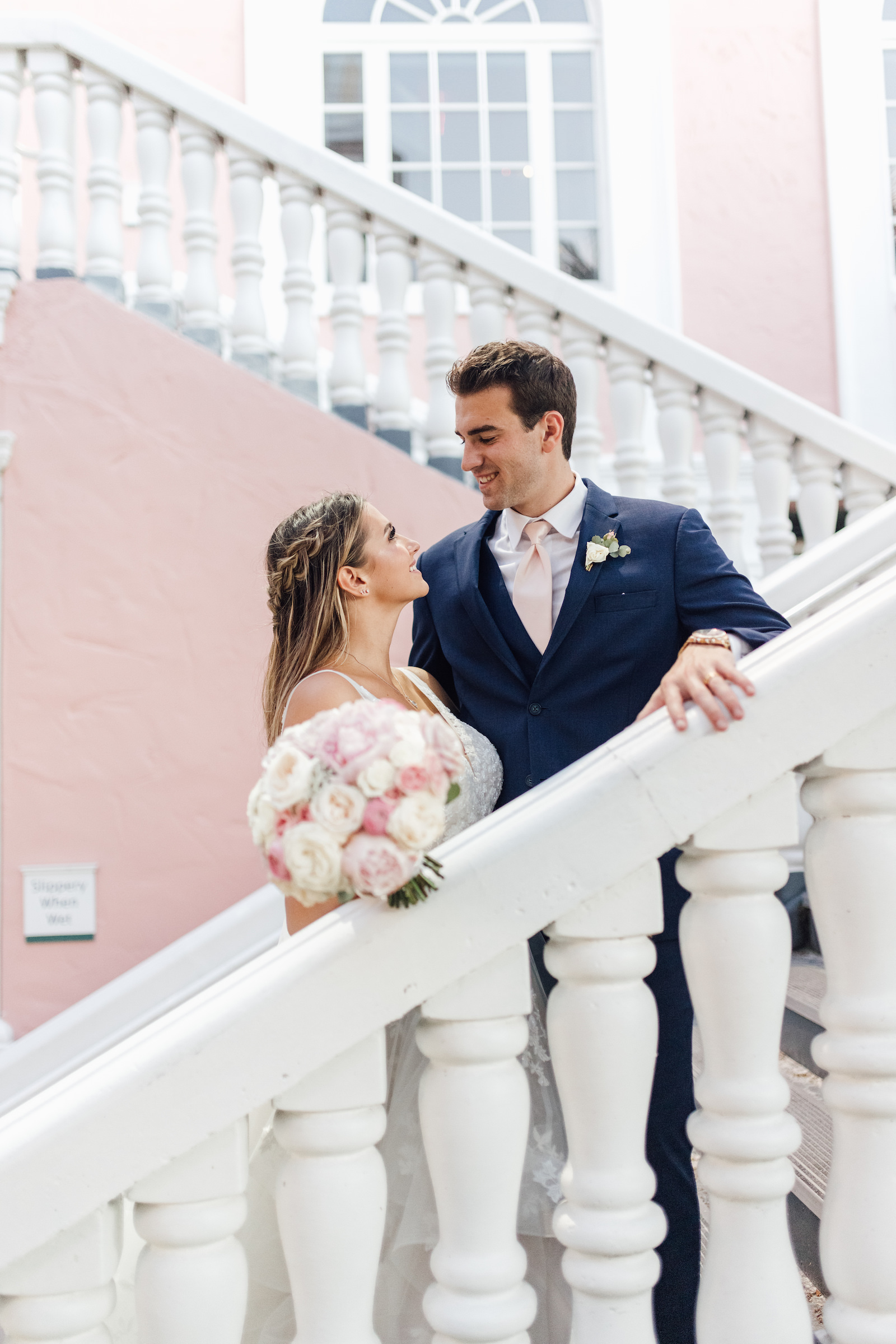 Bride and Groom Wedding Staircase Portrait | St. Pete Beach Wedding Venue The Don Cesar | Florist Bruce Wayne Florals