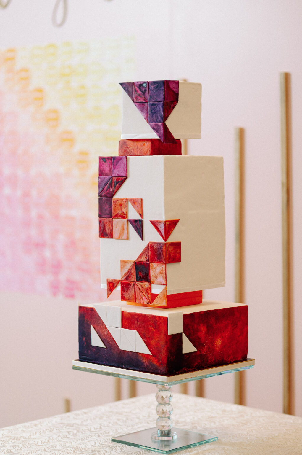 Unique Whimsical Geometric Three Tier Wedding Cake, Red, Purple, and Orange Swirled Painted Shapes | Tampa Bay Wedding Photographer Dewitt for Love | Wedding Cake The Artistic Whisk