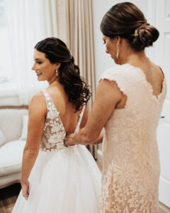 Bride Getting Ready with Mother of the Bride Wedding Portrait | Dress Shop and Designer: The White Magnolia, Paloma Blanca