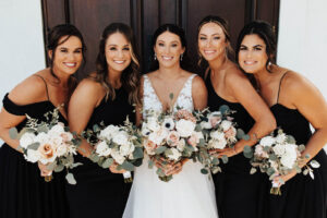 Bride with Bridesmaids in Mix and Match Black Floor Length Bridesmaid Gowns | Kleinfeld Bridal & David’s Bridal | Harborside Chapel