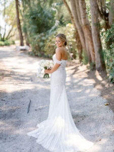 Florida Bride Wearing Provinias Wedding Dress with Floral Applique Off the Shoulder Sleeves with Sweetheart Neckline, Braided Updo, Luxurious Round Ivory Floral Bouquet with Orchids | Sarasota Wedding Venue The Resort at Longboat Key Club
