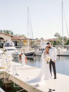 Sarasota Bride and Groom on Marina and Yacht Deck at Harbourside Lawn | Florida Wedding Venue The Resort at Longboat Key Club