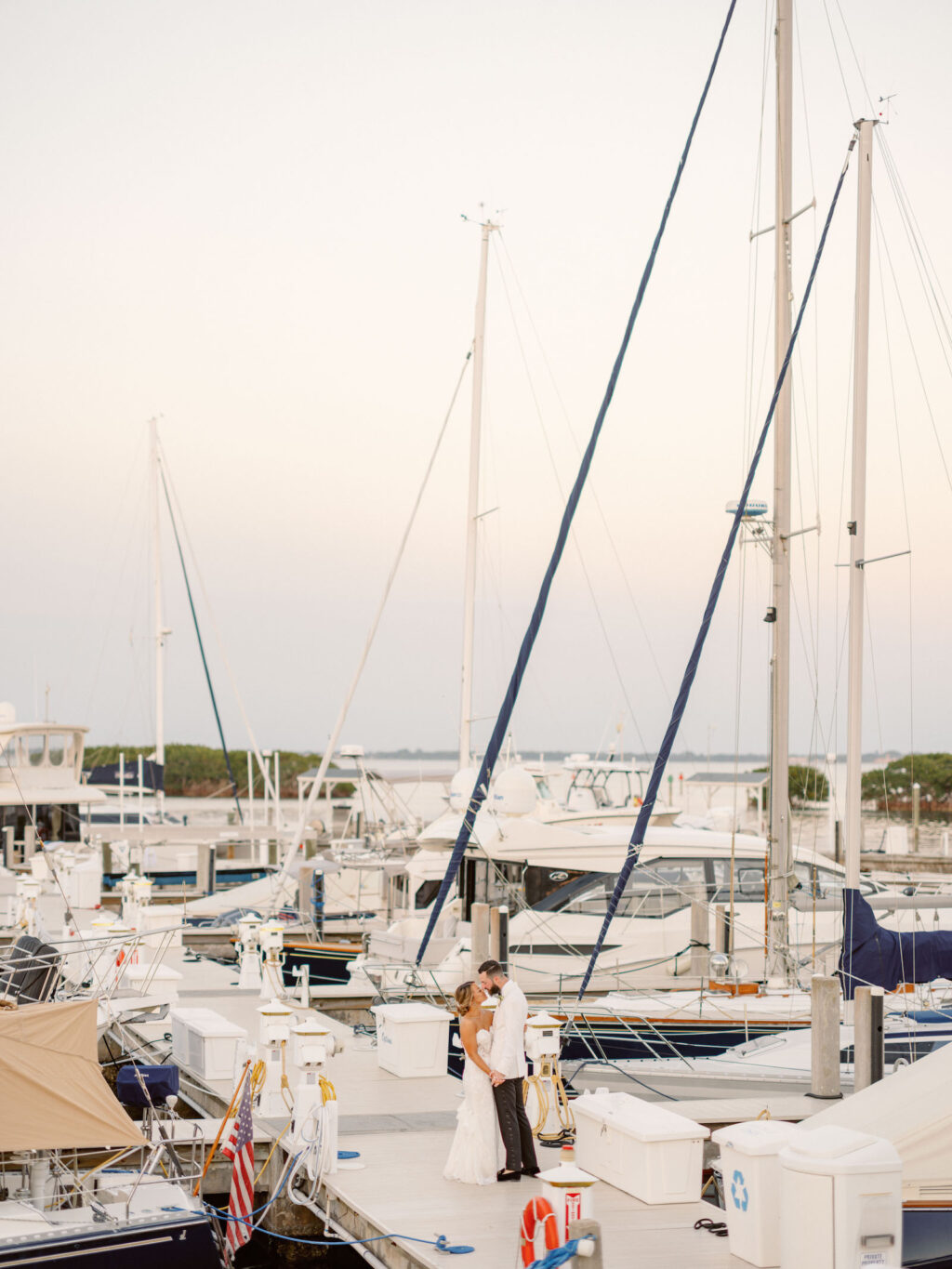 Sarasota Bride and Groom on Yacht Deck at Harbourside Lawn | Florida Wedding Venue The Resort at Longboat Key Club