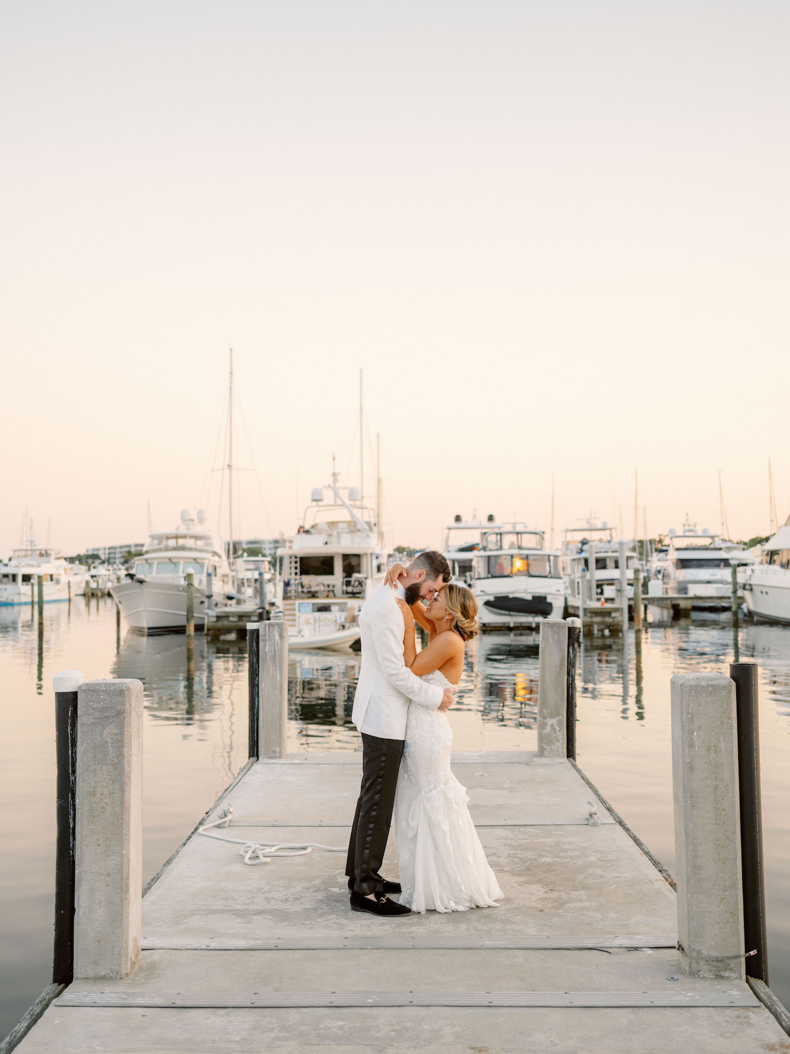 Sarasota Bride and Groom on Yacht Deck at Harbourside Lawn | Florida Wedding Venue The Resort at Longboat Key Club