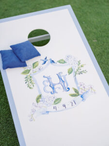 Florida Wedding Reception Decor and Details, Watercolor Custom Couple Seal, Dusty Blue and Greenery on Outdoor Game Table
