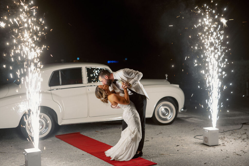 Florida Bride and Groom Grand Cold Sparkler Exit on Red Carpet to Classic White Rolls Royce Getaway Car