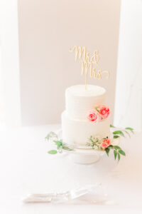 Romantic Pink Garden St. Pete Wedding Reception | White Two Tier Wedding Cake with Blush Pink Roses and Greenery, Gold Laser Cut Custom Cake Topper