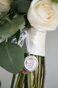 Silver Locket Necklace on Bridal Bouquet | Carrie Wildes Photography