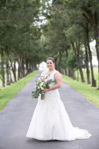 Florida Bride in Aline Gown and Lace Detailing with Fresh Eucalyptus and Roses Bridal Bouquet Portrait | Carrie Wildes Photography