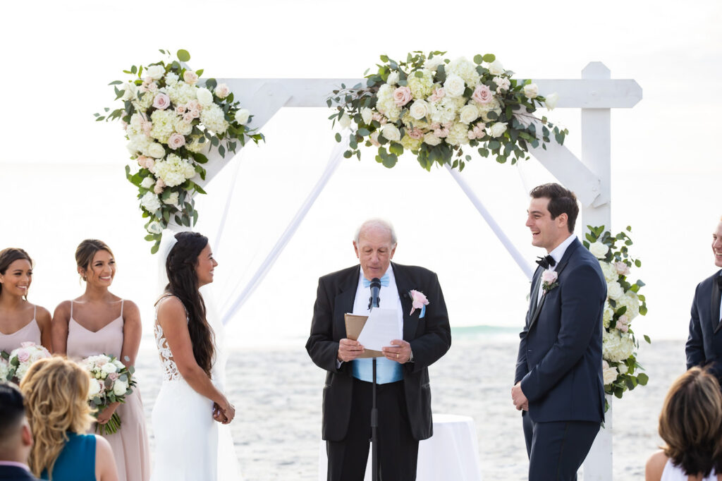 Bride and Groom Exchange Vows in Beachfront Florida Wedding Ceremony | The Resort at Longboat Key Club