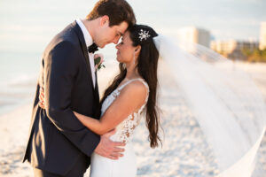 Bride and Groom Intimate Forehead Touching Beach Wedding Portrait | The Resort at Longboat Key | Femme Akoi Beauty