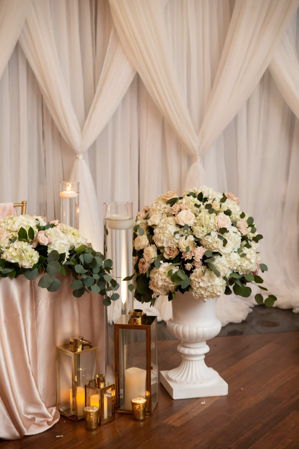White Backdrop Draping and Rose Gold Sweethear Table with White and Blush Rose Florals and Greenery | Elegant Wedding Reception at The Resort at Longboat Key