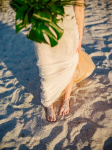 Florida Beach Bride Wearing Sparkle Gianni Bini Sandals in the Sand