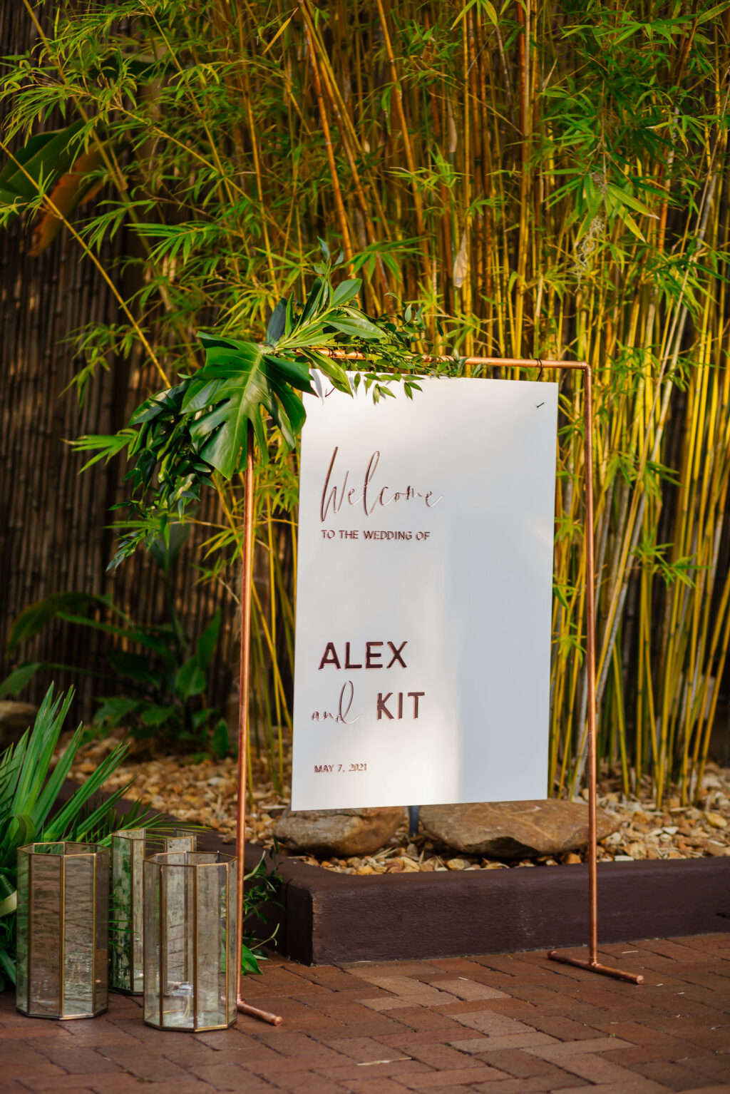 Tropical Inspired Florida Wedding Reception and Decor, Minimalist Gold Welcome Sign in Bamboo Courtyard | Unique Florida Wedding Venue NOVA 535 in Downtown St. Pete
