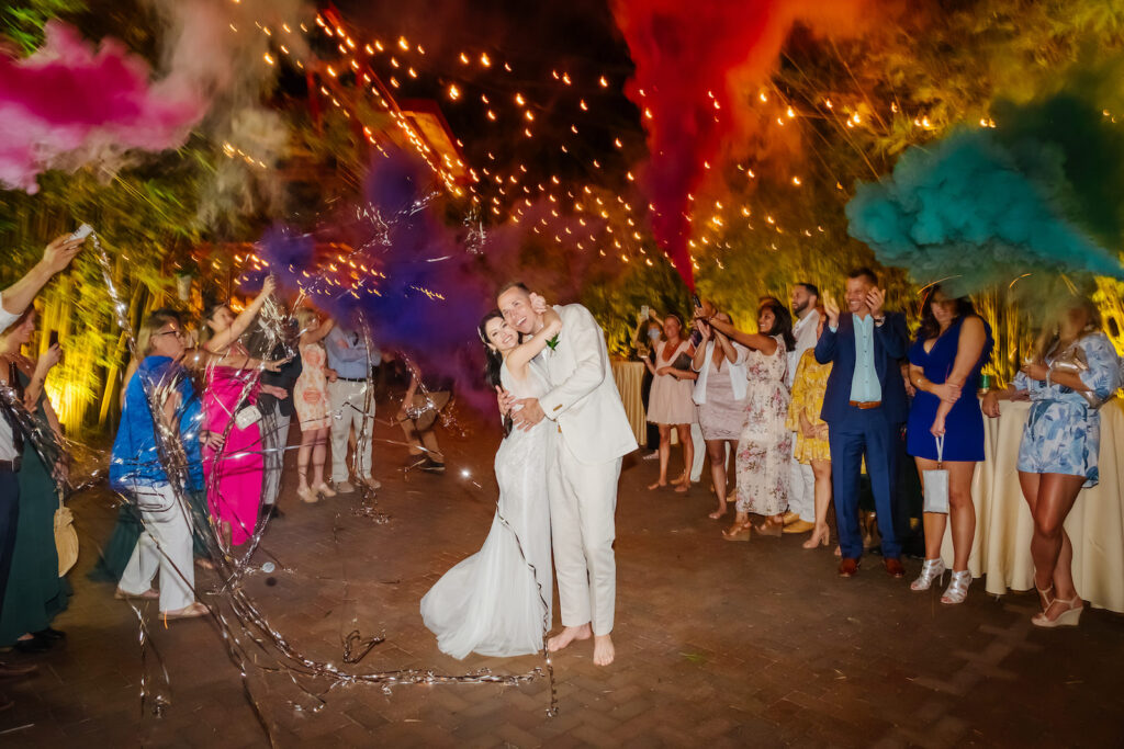 Florida Bride and Groom Wedding Color Smoke Bomb Exit with Confetti and Streamers | Tampa Bay Wedding Venue NOVA 535