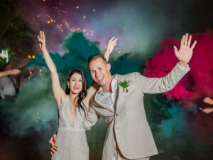 Florida Bride and Groom Wedding Color Smoke Bomb Exit