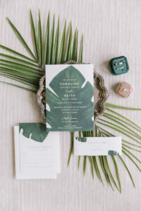 Tropical Pink and Green Monstera Leaf Painted Wedding Invitation Suite from Minted