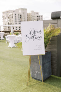 Tropical Pink and Green Wedding Reception Decor | Black and White Open Seating Signage | Tampa Bay Wedding Planner Coastal Coordinating | Rooftop Outdoor Wedding Venue Hotel Zamora