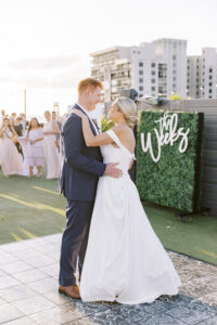 Tropical Pink and Green Wedding Reception | Bride and Groom First Dance | Tampa Bay Wedding DJ Graingertainment | Outdoor Rooftop St. Pete Waterfront Wedding Venue Hotel Zamora