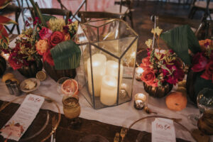 Candles Inside Clear Lantern on Wedding Reception Tables as Decor | Sarasota Wedding Planner MDP Events