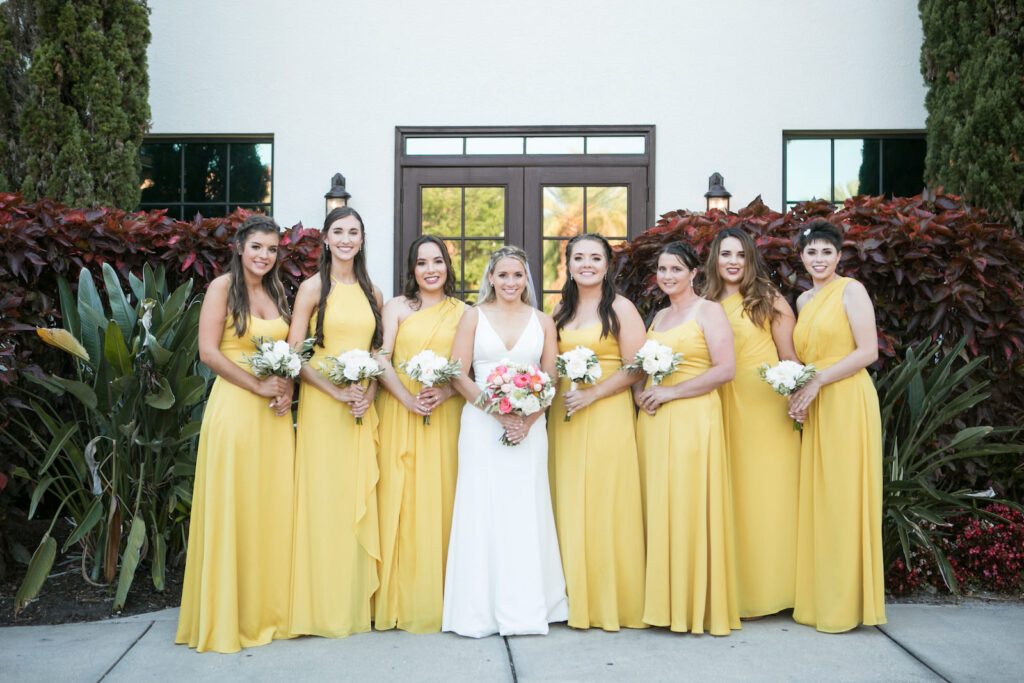 Bride with Bridesmaids in Floor Length Mix and Match Yellow Bridesmaid Dresses | Carrie Wildes Photography