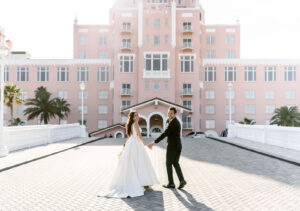 Florida Classic Timeless Bride and Groom Outside Historic St. Pete Wedding Venue Pink Palace The Don CeSar Hotel